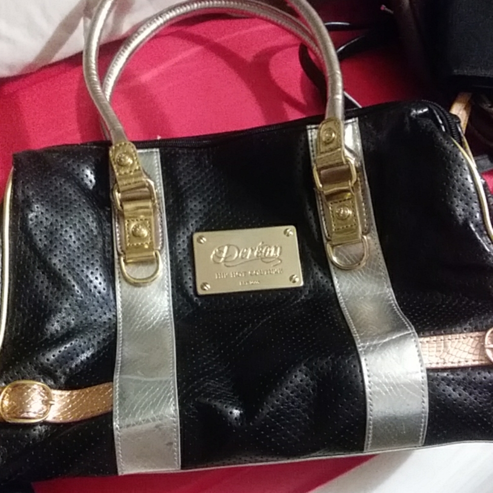 Dereon hip hop Couture hang bag